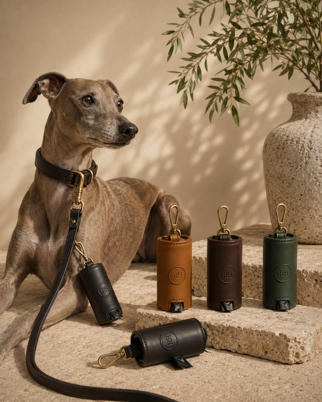 Richmond Hound Signature Leather Waste Bag Holder close-up with full-grain leather, satin brass clip and discreet RH embossing